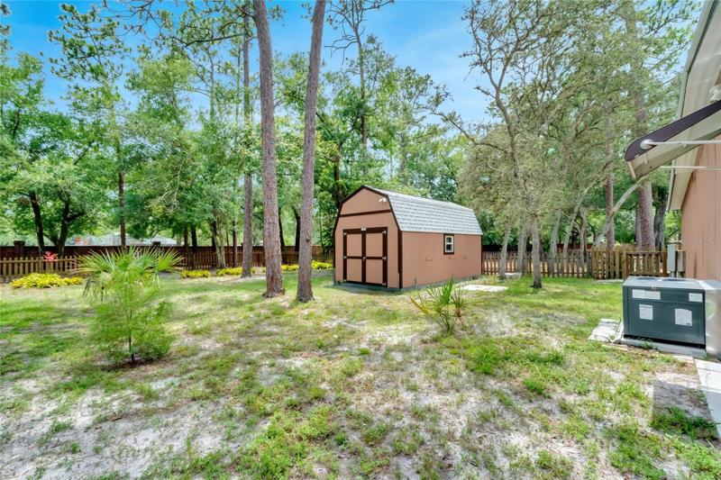 Large carport with shed for storage