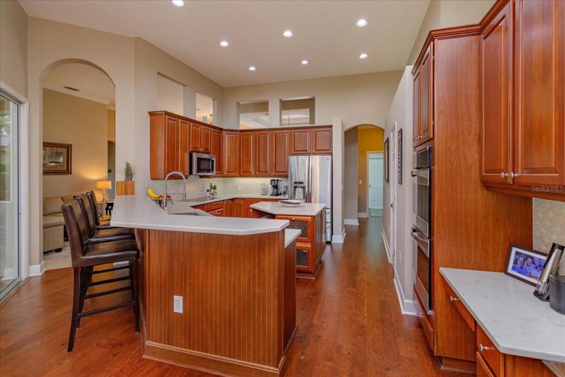 Kitchen- quartz counters, solid wood cabinets