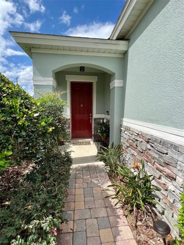 Stone accents leading to the 8' Entry door