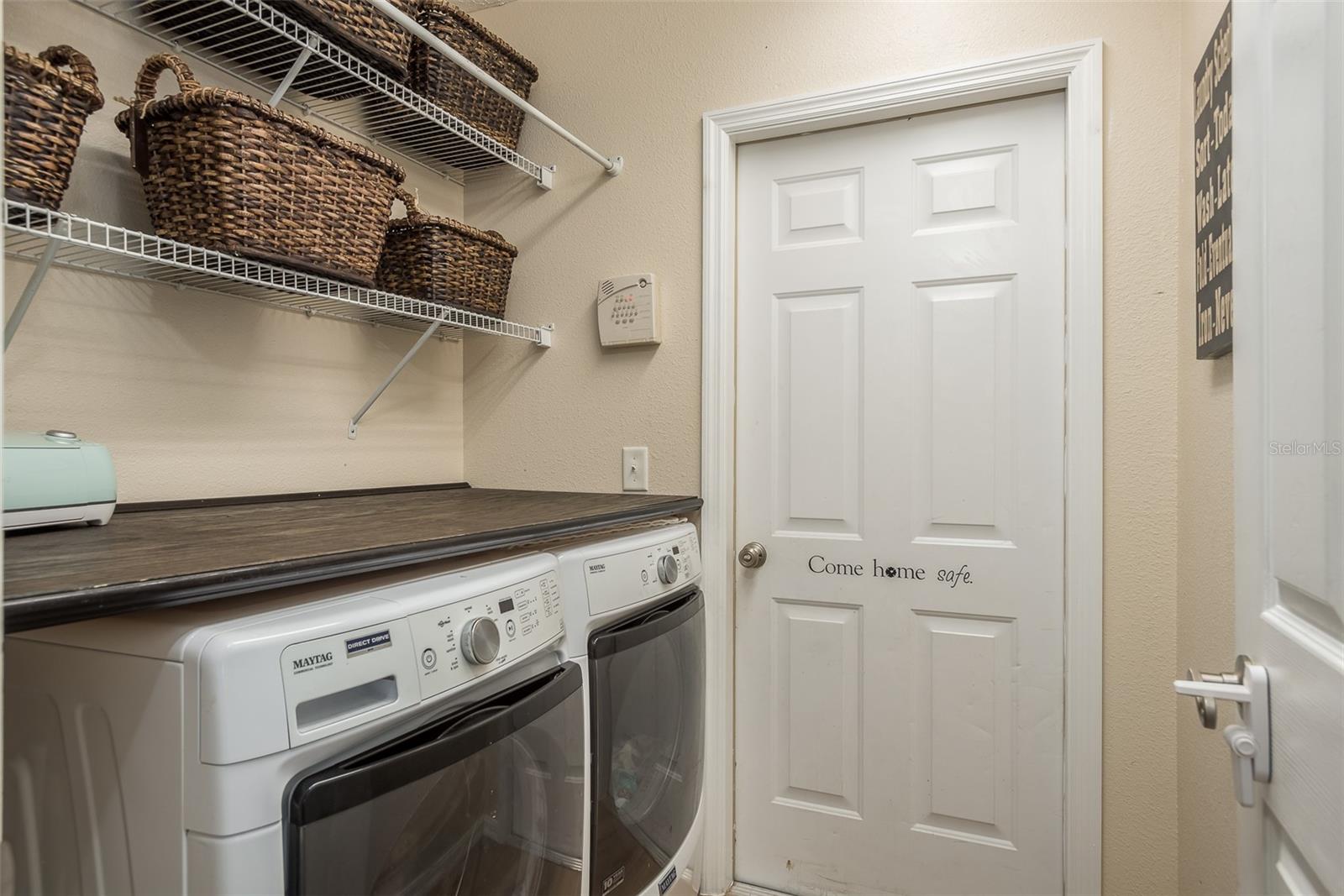 Laundry leading to garage