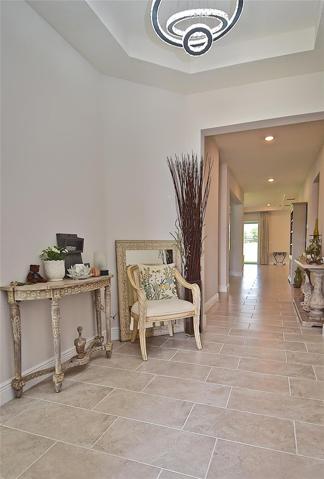Beautiful Regal Long Front Hallway with Tall Celings Throughout the Home