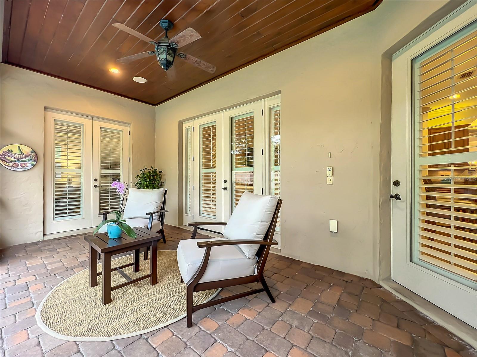 Outdoor space is screened in with retractable screen