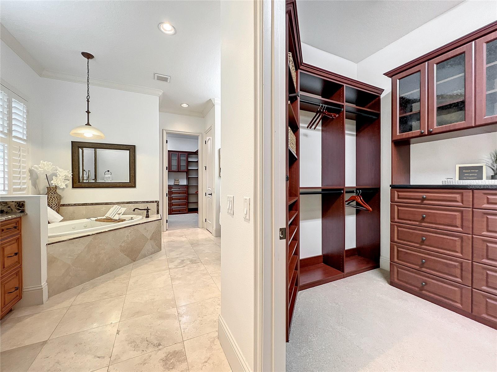 Vantage point from owners retreat: featuring his and hers closets