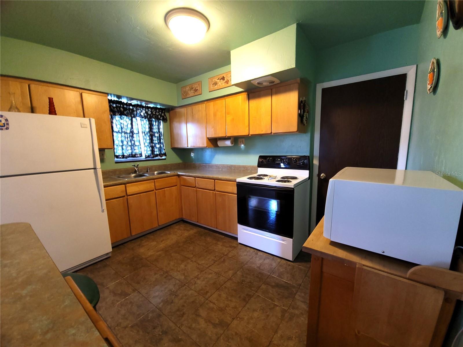 This is a functional kitchen but can easily be updated to a modern kitchen.