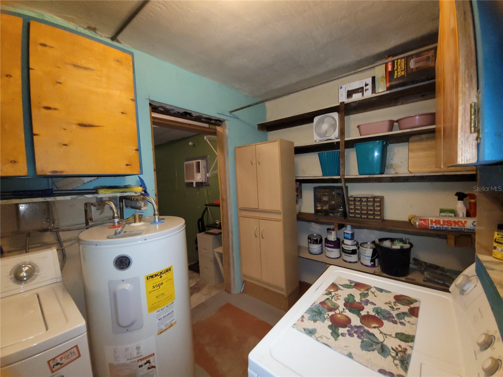 Laundry RM. located by the Kitchen door.