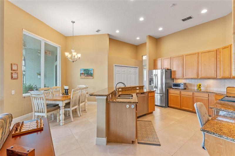 Eat in Nook with huge window overlooking the pool