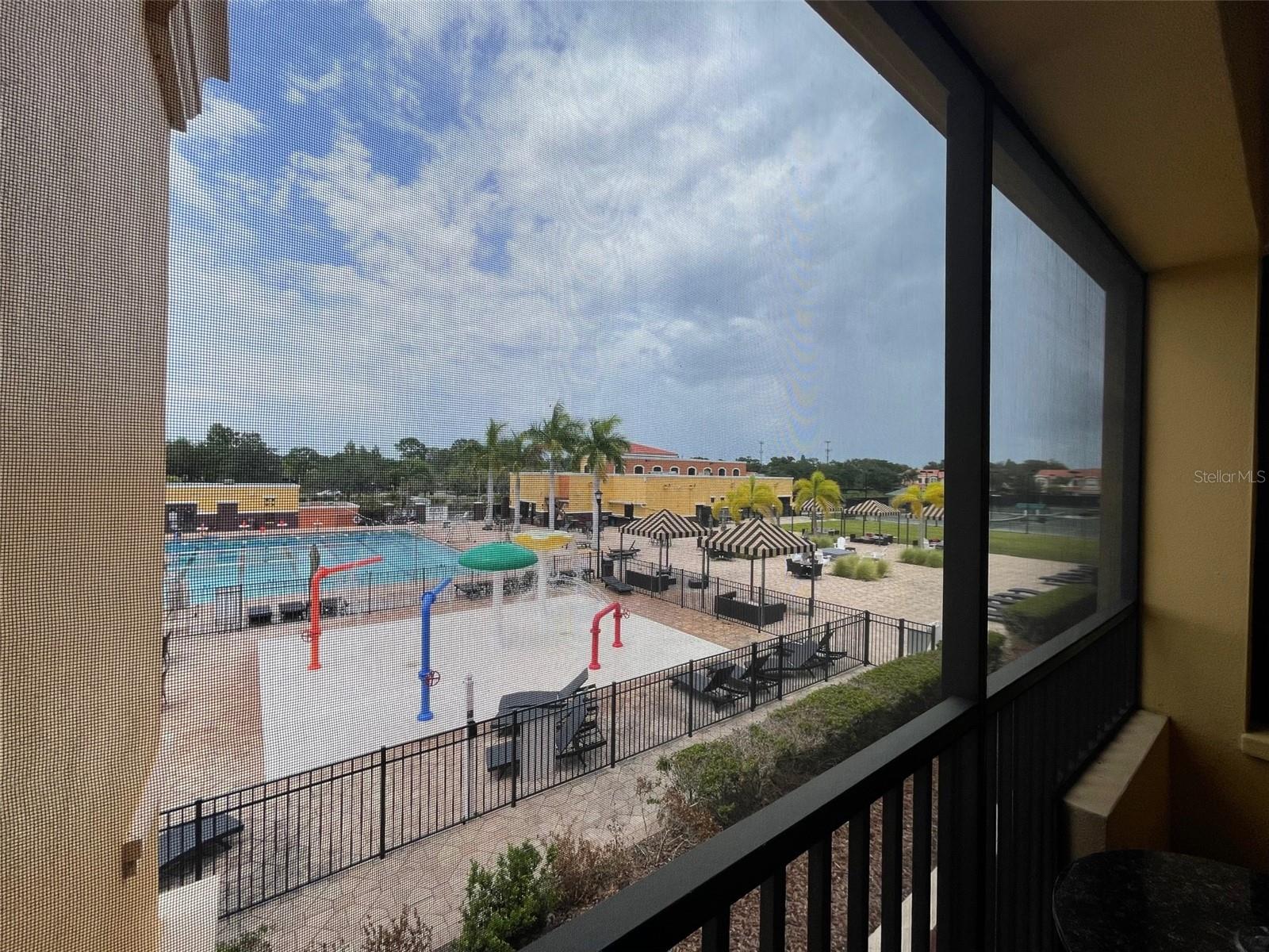 View of Tennis courts and pool