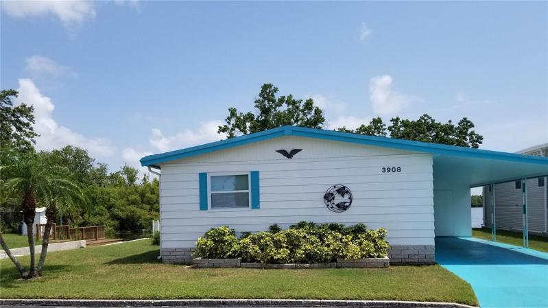 Front facing north. Community Boat ramp to the east. Newer shingle roof and windows.
