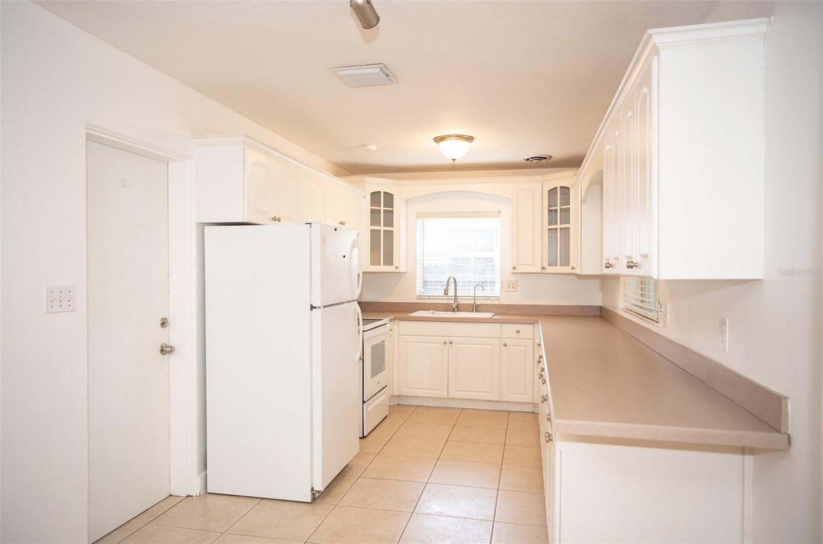 Kitchen opens to garage
