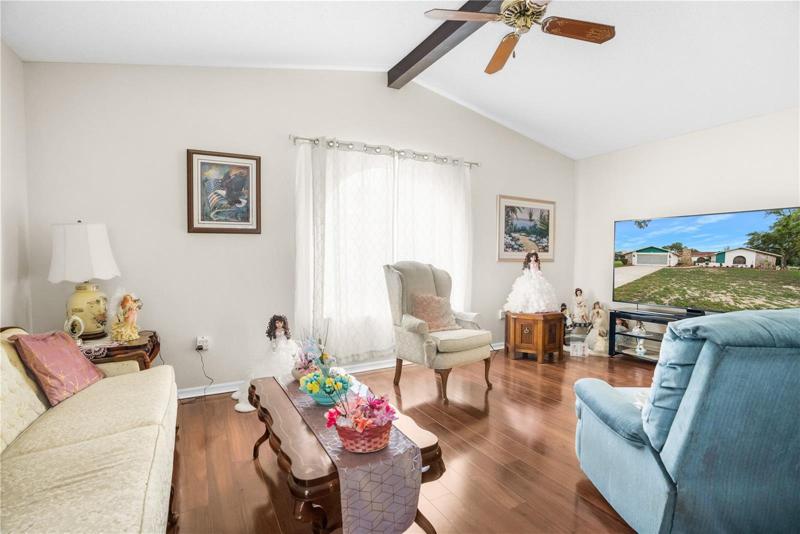 The Living Room also has Vaulted Ceilings with Beams