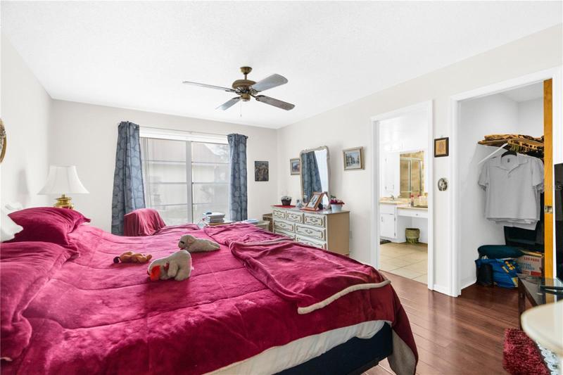Large Master Bedroom with a Walk-In Closet and En Suite Bath