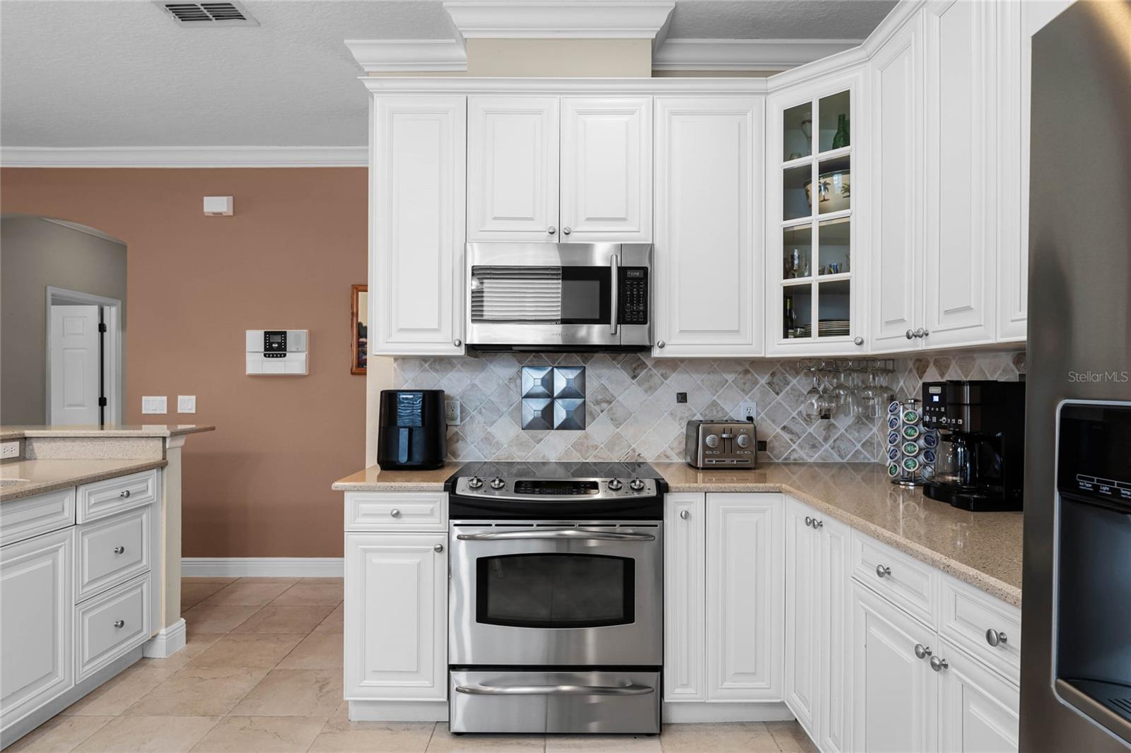 The kitchen boasts 42" cabinets with crown molding.