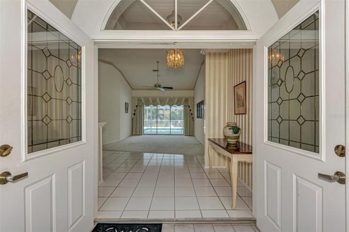 Entry View/Frech Doors with pocket sliders to the pool and beyond