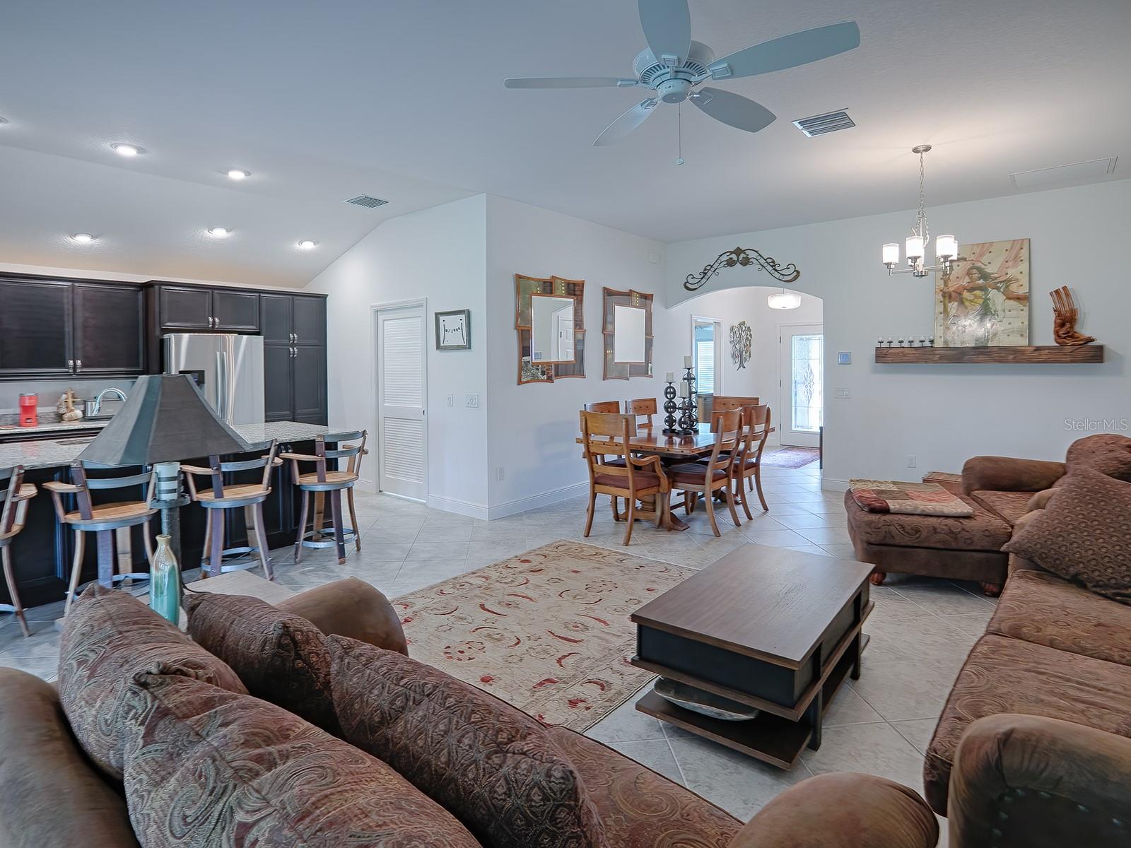 OPEN LIVING, DINING ROOM AND KITCHEN!  DIAGONAL TILE THROUGHOUT THE LIVING AREA, KITCHEN, LAUNDRY AND BATHS!