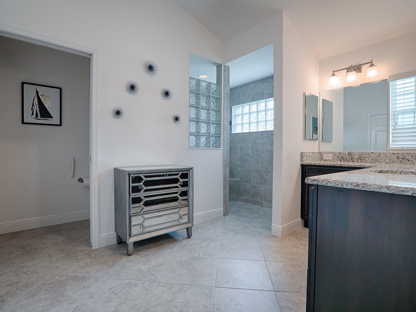 POCKET DOOR TO SEPARATE TOILET ROOM.