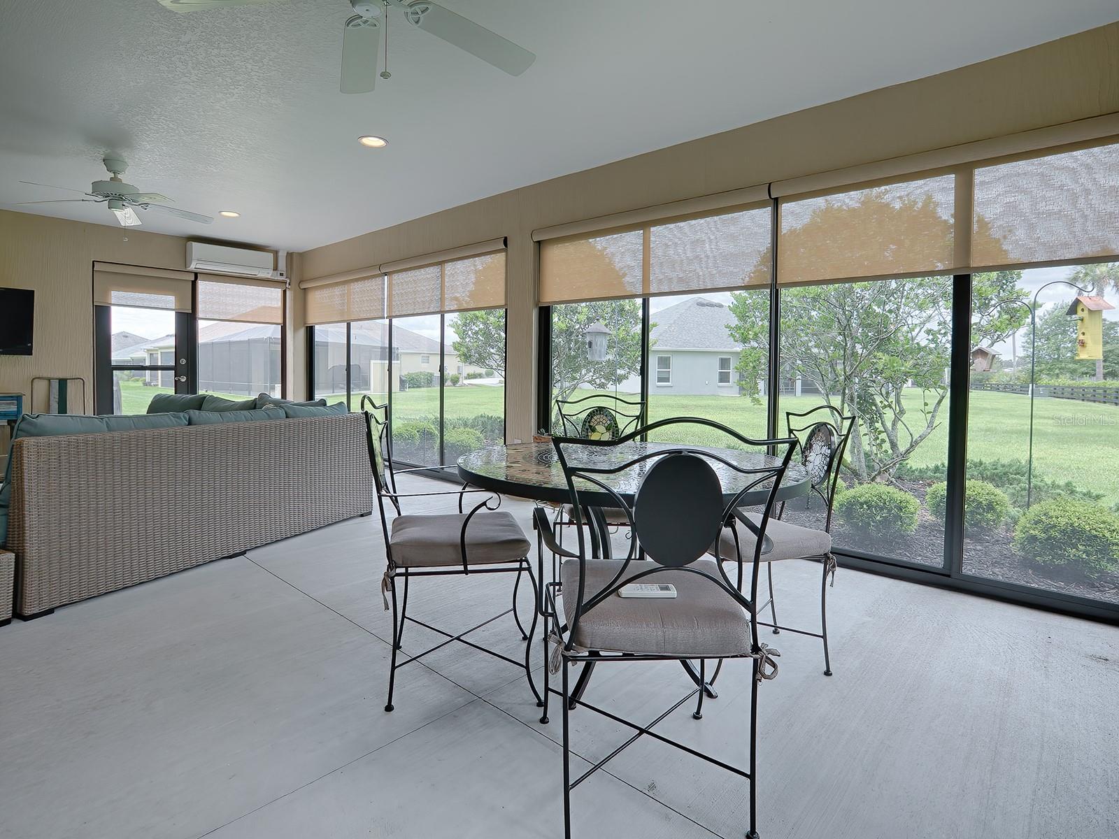 WALL MOUNTED TV CONVEYS WITH THE HOME!
