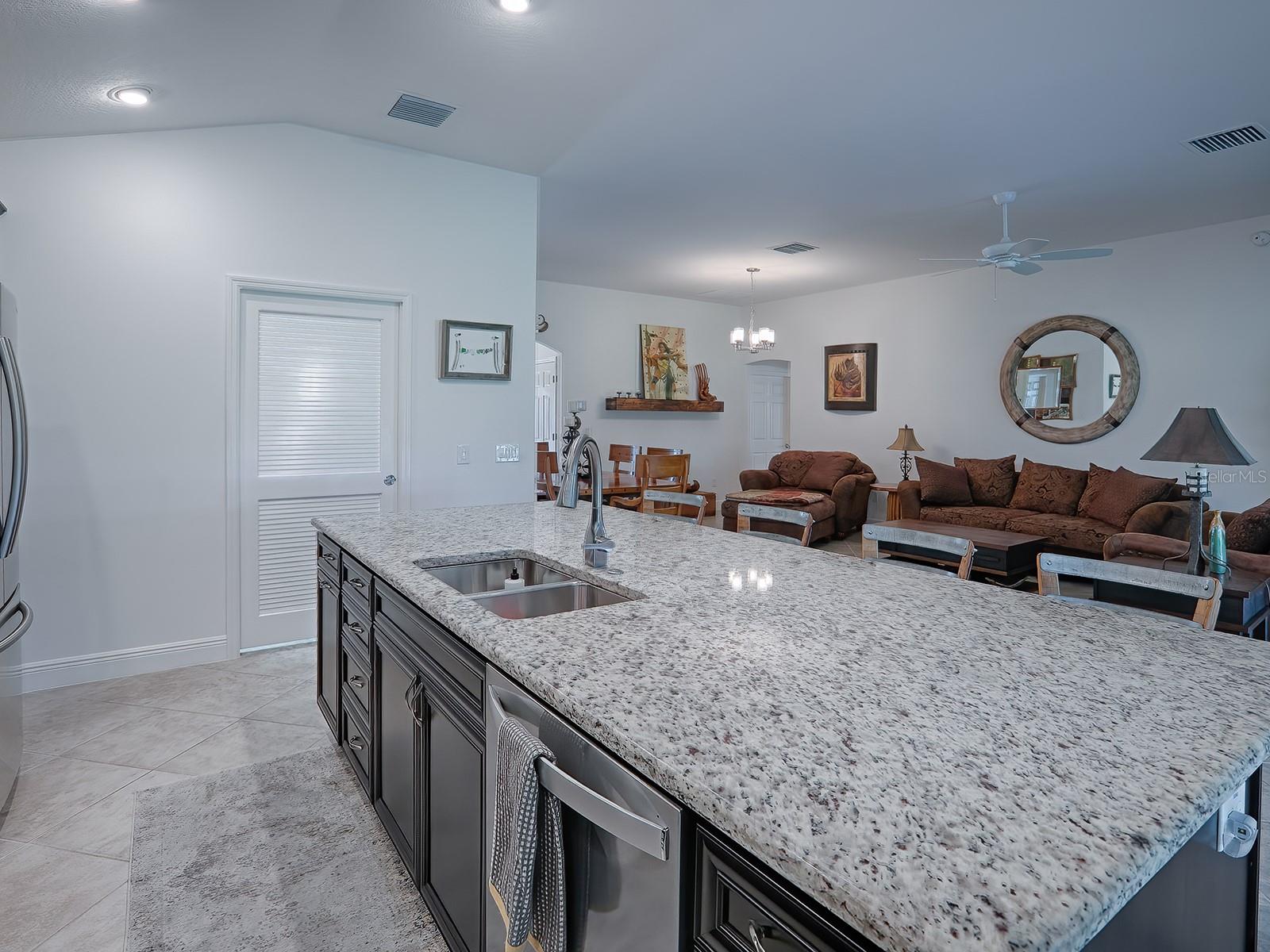 NICE OPEN KITCHEN.  LOUVERED DOOR TO THE LEFT IS THE LAUNDRY ROOM!