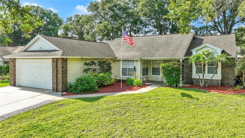 Well Maintained Corner Lot with Mature Landscaping