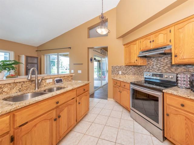 Real wood cabinets, granite countertops, tile backsplash