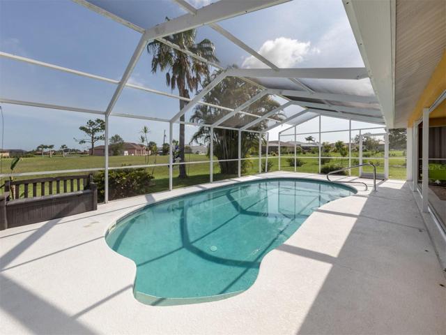 Pool is surrounded by community green space