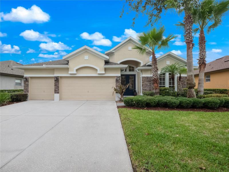 Beautiful exterior elevation and mature landscape
