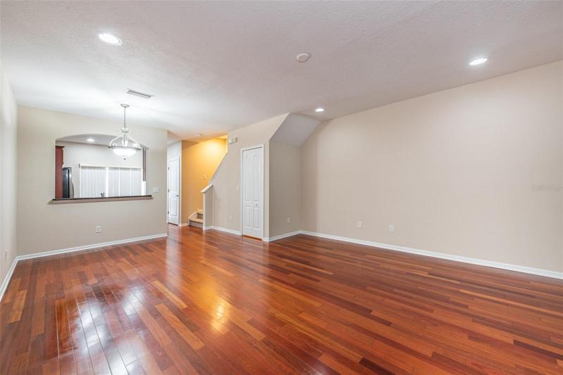 Beautiful cherry wood floors downstairs. There is a half bath downstairs as well.