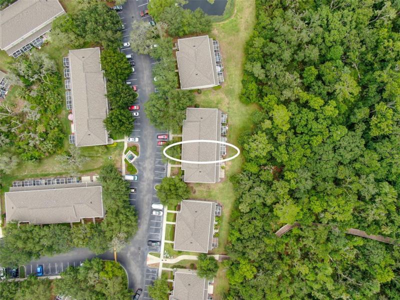 Aerial view shows the conservation area behind the unit, so no backyard neighbors.