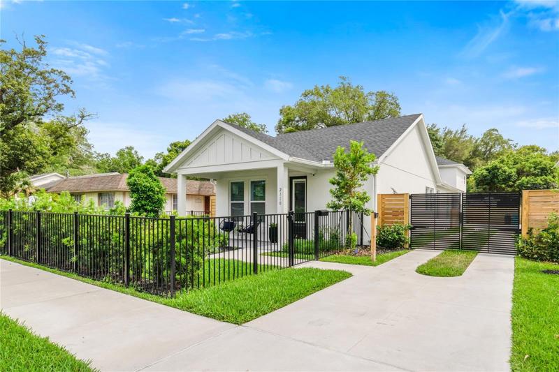 Main home is rented separately. The guest house sits behind the gates and over the two car detached garage.