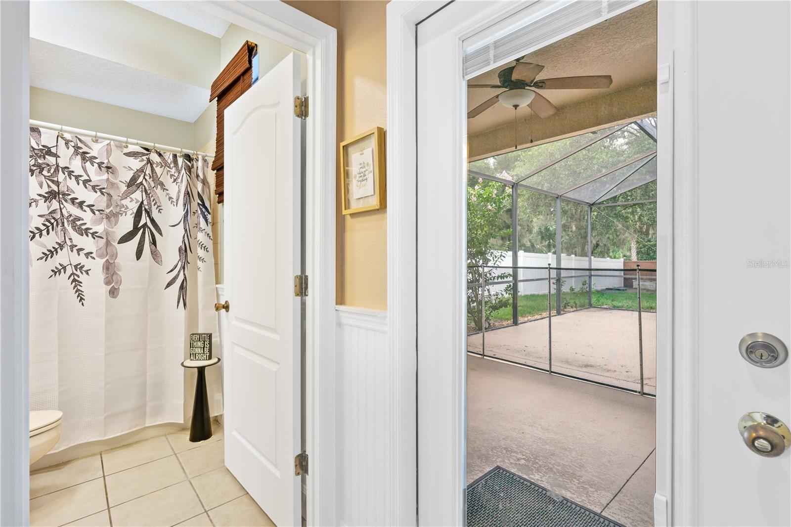 Adjacent to 2nd Bedroom, Guest Bath + Pool Access