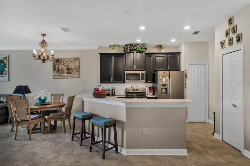 Large Breakfast Bar and two Closet Pantries