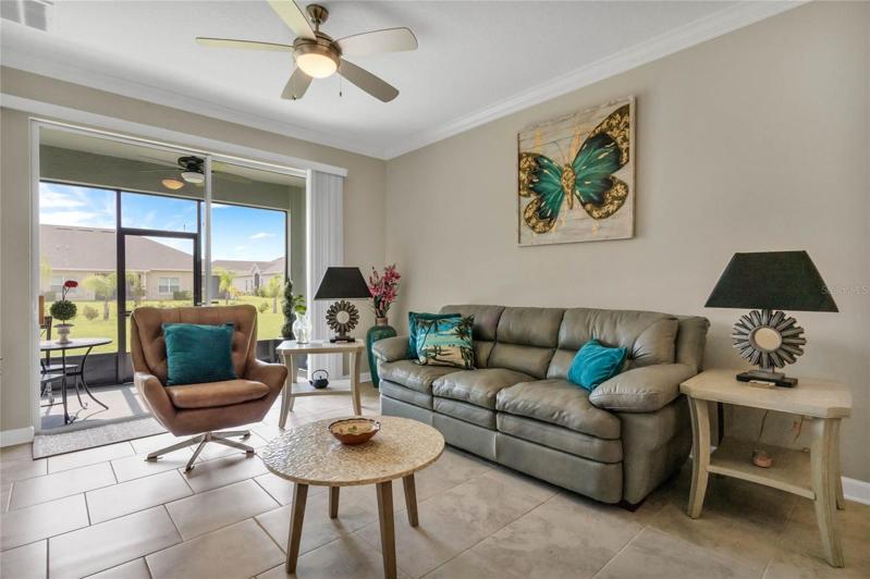 Living Room provides access to the Screened Lanai