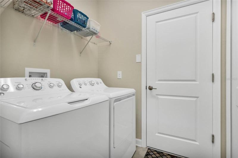 Laundry Room with Storage Closet