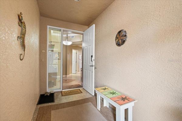 Screened front breezeway into home