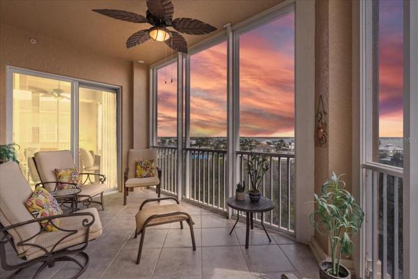 Large lanai at twilight overlooking the Bay