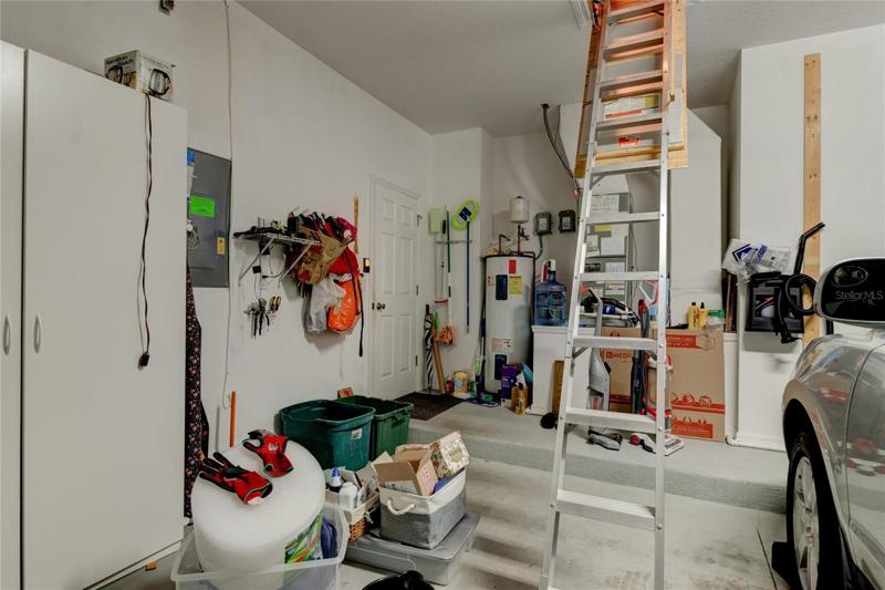 Garage - note sturdy folding aluminum attic access ladder