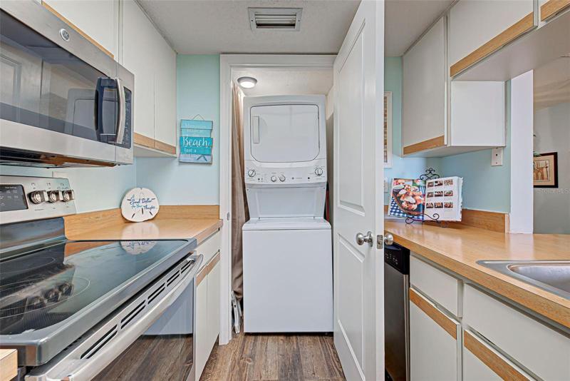 WASHER AND DRYER and hot water tank closet