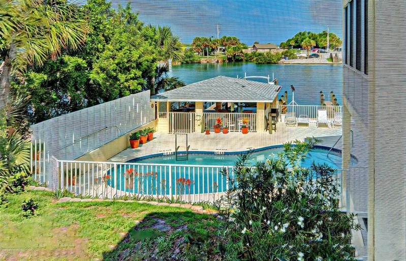 WHAT A VIEW FROM YOU OWN PRIVATE LANAI.   GREAT PLACE TO DINE, ENTERTAIN OR GO DOWN TO THE COVERED PATIO WATERSIDE TO BE RIGHT IN THE ACTION.   GREAT FISHING RIGHT FROM THE DOCK