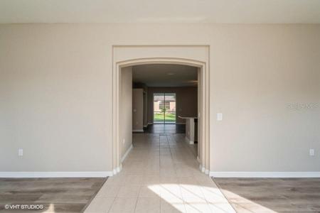 FROM FRONT DOOR UPON ENTERING, DINING TO RIGHT AND FORMAL LIVING ROOM TO LEFT