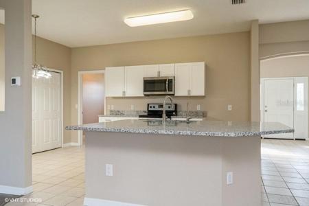 KITCHEN VIEW FROM FAMILY ROOM