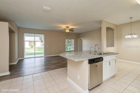 LOOKING TOWARDS FAMILY ROOM