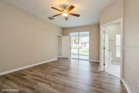 PRIMARY SUITE WITH SLIDERS TO LANAI