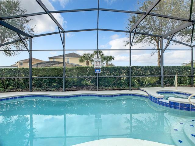 Screened pool with spa