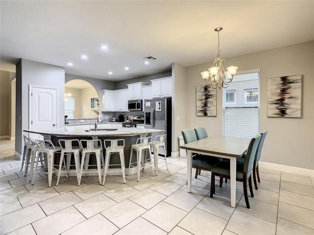 Kitchen with SS appliances and granite counter tops