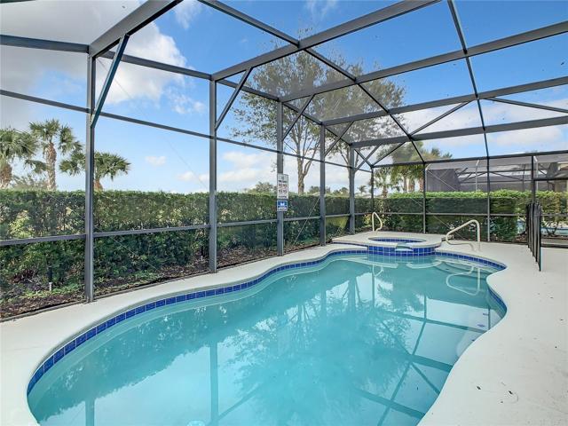 Screened pool with spa