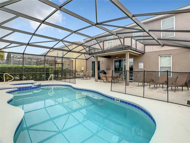 Screened pool with spa