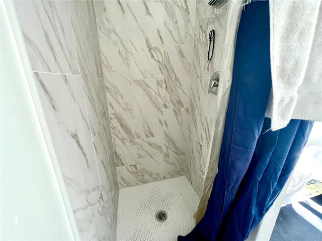 Duplex Unit A- bathroom w/ brand new shower