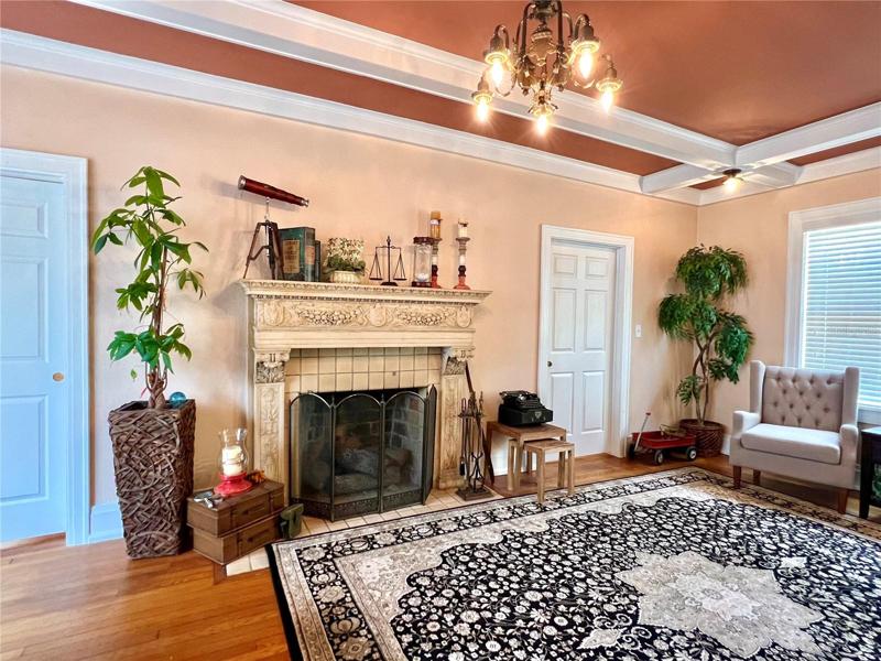 sitting area in main building w/ pretty fireplace
