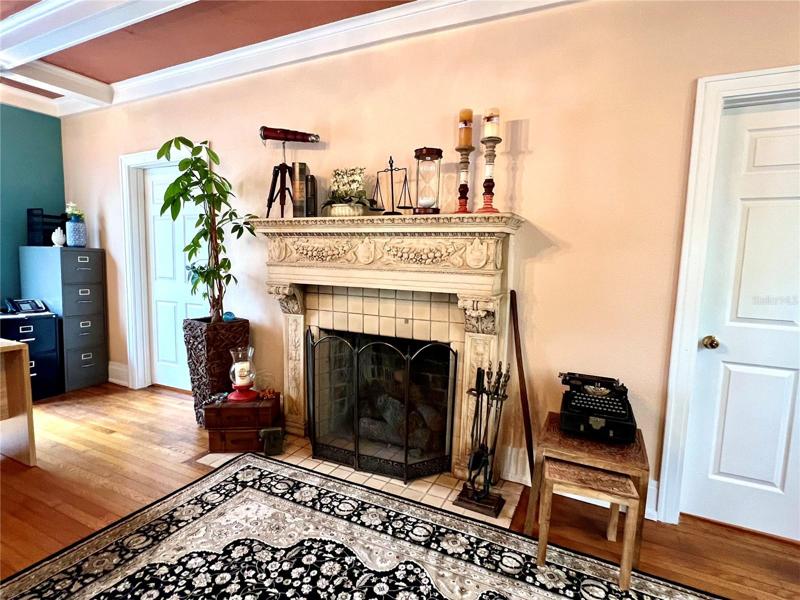 Sitting area in main building w/ pretty fireplace