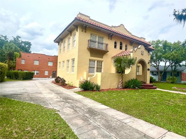 additional parking on side of main building, duplex behind main parking area