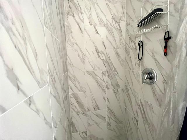 Duplex Unit A- bathroom w/ new shower